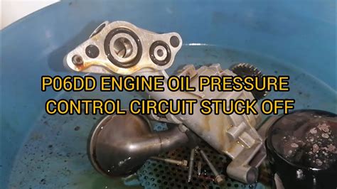 Vehicle setting code P06DD, no or low oil pressure, oil control valve may be stuck off commanding high oil pressures (95 psi) and or oil pump . . Engine oil pressure control solenoid valve stuck off 2014 silverado